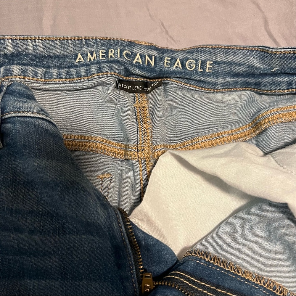 AE Next Level Distressed Curvy Highest Waist Jegging Size 14